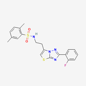 molecular formula C20H19FN4O2S2 B2437682 N-{2-[2-(2-fluorophenyl)-[1,2,4]triazolo[3,2-b][1,3]thiazol-6-yl]ethyl}-2,5-dimethylbenzene-1-sulfonamide CAS No. 946274-41-5