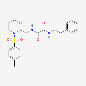 B2439616 N1-phenethyl-N2-((3-tosyl-1,3-oxazinan-2-yl)methyl)oxalamide CAS No. 869071-43-2