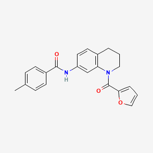 molecular formula C22H20N2O3 B2441500 N-[1-(furan-2-carbonyl)-1,2,3,4-tetrahydroquinolin-7-yl]-4-methylbenzamide CAS No. 946265-80-1