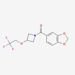 molecular formula C13H12F3NO4 B2441545 Benzo[d][1,3]dioxol-5-yl(3-(2,2,2-trifluoroethoxy)azetidin-1-yl)methanone CAS No. 2034250-04-7