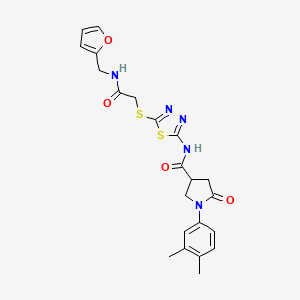 1-(3,4-dimethylphenyl)-N-(5-((2-((furan-2-ylmethyl)amino)-2-oxoethyl)thio)-1,3,4-thiadiazol-2-yl)-5-oxopyrrolidine-3-carboxamide