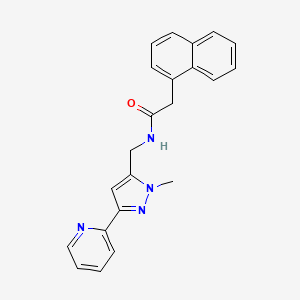 molecular formula C22H20N4O B2446720 N-{[1-methyl-3-(pyridin-2-yl)-1H-pyrazol-5-yl]methyl}-2-(naphthalen-1-yl)acetamide CAS No. 2309749-19-5