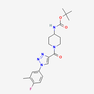 molecular formula C20H26FN5O3 B2447286 tert-butyl (1-{[1-(4-fluoro-3-methylphenyl)-1H-1,2,3-triazol-4-yl]carbonyl}piperidin-4-yl)carbamate CAS No. 1260914-55-3