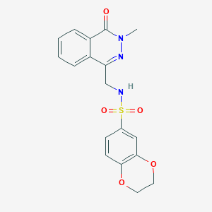 molecular formula C18H17N3O5S B2448207 N-((3-methyl-4-oxo-3,4-dihydrophthalazin-1-yl)methyl)-2,3-dihydrobenzo[b][1,4]dioxine-6-sulfonamide CAS No. 1396870-90-8