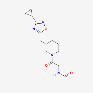 molecular formula C15H22N4O3 B2450318 N-(2-(3-((3-cyclopropyl-1,2,4-oxadiazol-5-yl)methyl)piperidin-1-yl)-2-oxoethyl)acetamide CAS No. 1706102-10-4