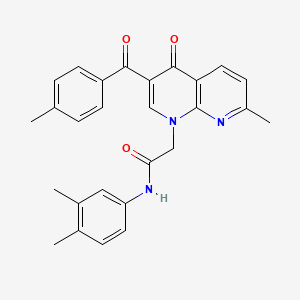 N-(3,4-dimethylphenyl)-2-(7-methyl-3-(4-methylbenzoyl)-4-oxo-1,8-naphthyridin-1(4H)-yl)acetamide