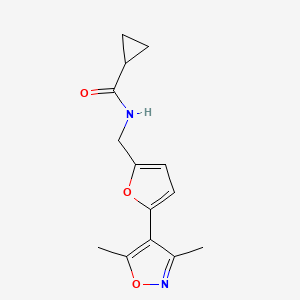 molecular formula C14H16N2O3 B2452850 N-{[5-(3,5-dimethyl-1,2-oxazol-4-yl)furan-2-yl]methyl}cyclopropanecarboxamide CAS No. 2415620-66-3
