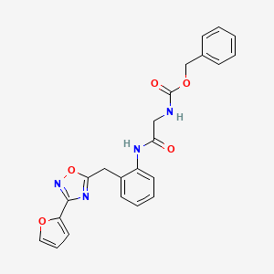Benzyl (2-((2-((3-(furan-2-yl)-1,2,4-oxadiazol-5-yl)methyl)phenyl)amino)-2-oxoethyl)carbamate