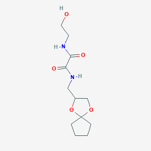 B2455202 N1-(1,4-dioxaspiro[4.4]nonan-2-ylmethyl)-N2-(2-hydroxyethyl)oxalamide CAS No. 941914-66-5