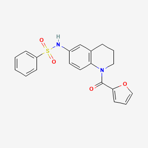 molecular formula C20H18N2O4S B2456353 N-[1-(furan-2-carbonyl)-1,2,3,4-tetrahydroquinolin-6-yl]benzenesulfonamide CAS No. 946246-76-0