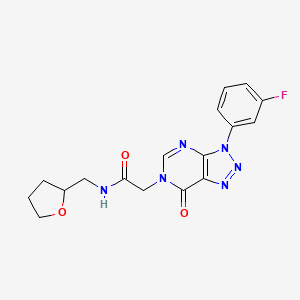2-(3-(3-fluorophenyl)-7-oxo-3H-[1,2,3]triazolo[4,5-d]pyrimidin-6(7H)-yl)-N-((tetrahydrofuran-2-yl)methyl)acetamide