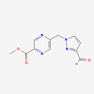 molecular formula C11H10N4O3 B2458295 Methyl 5-[(3-formylpyrazol-1-yl)methyl]pyrazine-2-carboxylate CAS No. 2138308-19-5