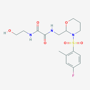 B2458814 N1-((3-((4-fluoro-2-methylphenyl)sulfonyl)-1,3-oxazinan-2-yl)methyl)-N2-(2-hydroxyethyl)oxalamide CAS No. 872987-13-8