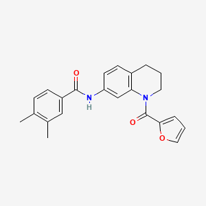 molecular formula C23H22N2O3 B2459826 N-[1-(furan-2-carbonyl)-1,2,3,4-tetrahydroquinolin-7-yl]-3,4-dimethylbenzamide CAS No. 946319-81-9