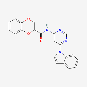 molecular formula C21H16N4O3 B2459888 N-(6-(1H-indol-1-yl)pyrimidin-4-yl)-2,3-dihydrobenzo[b][1,4]dioxine-2-carboxamide CAS No. 1428372-84-2