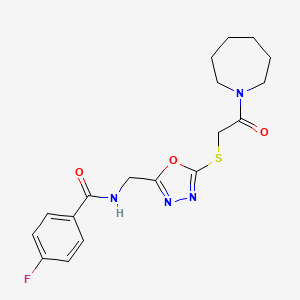 molecular formula C18H21FN4O3S B2460605 N-[(5-{[2-(azepan-1-yl)-2-oxoethyl]sulfanyl}-1,3,4-oxadiazol-2-yl)methyl]-4-fluorobenzamide CAS No. 904270-77-5