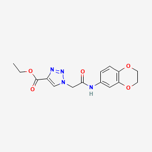 molecular formula C15H16N4O5 B2461001 ethyl 1-[2-(2,3-dihydro-1,4-benzodioxin-6-ylamino)-2-oxoethyl]-1H-1,2,3-triazole-4-carboxylate CAS No. 892293-59-3
