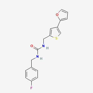 B2461394 1-[(4-Fluorophenyl)methyl]-3-[[4-(furan-2-yl)thiophen-2-yl]methyl]urea CAS No. 2379995-62-5