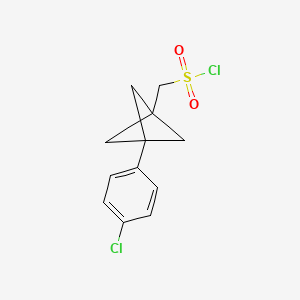 molecular formula C12H12Cl2O2S B2462061 [3-(4-Chlorophenyl)-1-bicyclo[1.1.1]pentanyl]methanesulfonyl chloride CAS No. 2287300-53-0