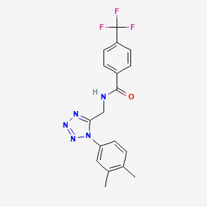 molecular formula C18H16F3N5O B2463678 N-{[1-(3,4-dimethylphenyl)-1H-1,2,3,4-tetrazol-5-yl]methyl}-4-(trifluoromethyl)benzamide CAS No. 897622-41-2