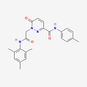 molecular formula C23H24N4O3 B2464782 N-(4-methylphenyl)-6-oxo-1-{[(2,4,6-trimethylphenyl)carbamoyl]methyl}-1,6-dihydropyridazine-3-carboxamide CAS No. 932990-75-5