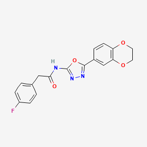 molecular formula C18H14FN3O4 B2465082 N-[5-(2,3-dihydro-1,4-benzodioxin-6-yl)-1,3,4-oxadiazol-2-yl]-2-(4-fluorophenyl)acetamide CAS No. 899731-92-1