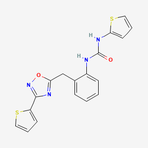 B2465191 1-(Thiophen-2-yl)-3-(2-((3-(thiophen-2-yl)-1,2,4-oxadiazol-5-yl)methyl)phenyl)urea CAS No. 1797598-71-0