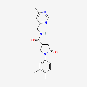 1-(3,4-dimethylphenyl)-N-((6-methylpyrimidin-4-yl)methyl)-5-oxopyrrolidine-3-carboxamide