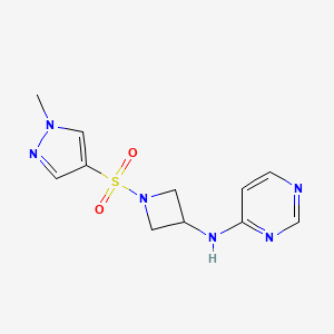 molecular formula C11H14N6O2S B2467202 N-{1-[(1-methyl-1H-pyrazol-4-yl)sulfonyl]azetidin-3-yl}pyrimidin-4-amine CAS No. 2097918-23-3