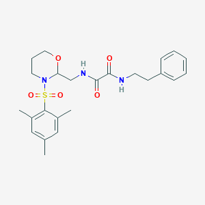 B2467534 N1-((3-(mesitylsulfonyl)-1,3-oxazinan-2-yl)methyl)-N2-phenethyloxalamide CAS No. 872976-04-0