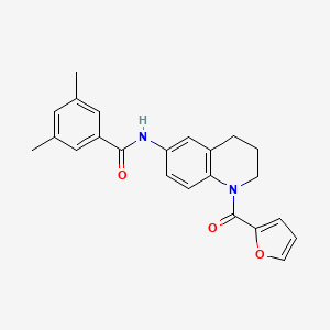 molecular formula C23H22N2O3 B2469412 N-[1-(furan-2-carbonyl)-1,2,3,4-tetrahydroquinolin-6-yl]-3,5-dimethylbenzamide CAS No. 946367-43-7