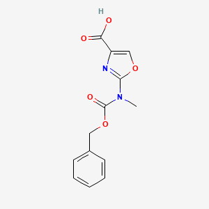molecular formula C13H12N2O5 B2469642 2-[Methyl(phenylmethoxycarbonyl)amino]-1,3-oxazole-4-carboxylic acid CAS No. 2248307-95-9
