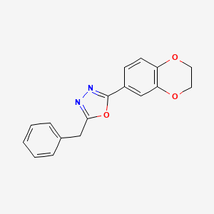 molecular formula C17H14N2O3 B2469844 2-Benzyl-5-(2,3-dihydrobenzo[b][1,4]dioxin-6-yl)-1,3,4-oxadiazole CAS No. 1081122-92-0