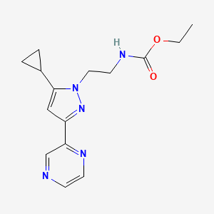 molecular formula C15H19N5O2 B2472898 ethyl (2-(5-cyclopropyl-3-(pyrazin-2-yl)-1H-pyrazol-1-yl)ethyl)carbamate CAS No. 2034601-25-5
