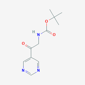 molecular formula C11H15N3O3 B2479333 Tert-butyl N-(2-oxo-2-pyrimidin-5-ylethyl)carbamate CAS No. 2008482-17-3