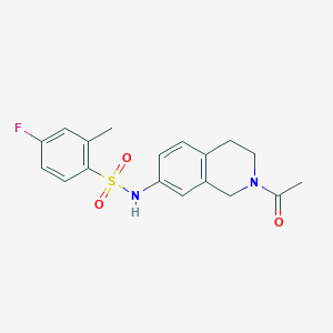 molecular formula C18H19FN2O3S B2481266 N-(2-acetyl-1,2,3,4-tetrahydroisoquinolin-7-yl)-4-fluoro-2-methylbenzene-1-sulfonamide CAS No. 955673-47-9