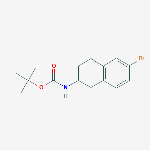 molecular formula C15H20BrNO2 B2481859 Tert-butyl N-(6-bromo-1,2,3,4-tetrahydronaphthalen-2-yl)carbamate CAS No. 133277-10-8