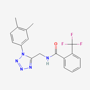 molecular formula C18H16F3N5O B2483682 N-{[1-(3,4-dimethylphenyl)-1H-1,2,3,4-tetrazol-5-yl]methyl}-2-(trifluoromethyl)benzamide CAS No. 897622-39-8