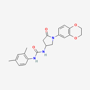 molecular formula C21H23N3O4 B2490678 3-[1-(2,3-dihydro-1,4-benzodioxin-6-yl)-5-oxopyrrolidin-3-yl]-1-(2,4-dimethylphenyl)urea CAS No. 877641-04-8