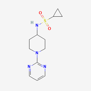 molecular formula C12H18N4O2S B2491325 N-[1-(pyrimidin-2-yl)piperidin-4-yl]cyclopropanesulfonamide CAS No. 2415556-01-1