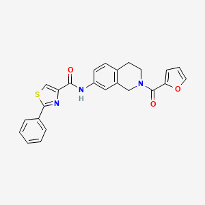 molecular formula C24H19N3O3S B2496222 N-(2-(furan-2-carbonyl)-1,2,3,4-tetrahydroisoquinolin-7-yl)-2-phenylthiazole-4-carboxamide CAS No. 1448027-88-0