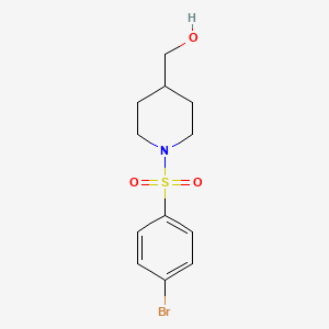 molecular formula C12H16BrNO3S B2496359 {1-[(4-Bromophenyl)sulfonyl]-4-piperidinyl}methanol CAS No. 937012-94-7