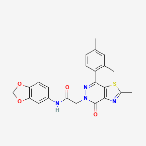 molecular formula C23H20N4O4S B2496988 N-(2H-1,3-benzodioxol-5-yl)-2-[7-(2,4-dimethylphenyl)-2-methyl-4-oxo-4H,5H-[1,3]thiazolo[4,5-d]pyridazin-5-yl]acetamide CAS No. 941943-51-7