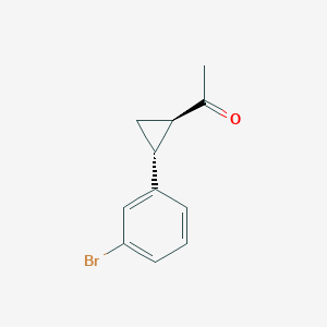 molecular formula C11H11BrO B2498559 1-[(1R,2R)-2-(3-Bromophenyl)cyclopropyl]ethanone CAS No. 1218625-92-3