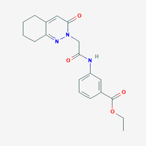 molecular formula C19H21N3O4 B2498619 ethyl 3-[2-(3-oxo-2,3,5,6,7,8-hexahydrocinnolin-2-yl)acetamido]benzoate CAS No. 932972-11-7