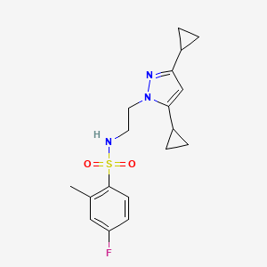 molecular formula C18H22FN3O2S B2498933 N-[2-(3,5-dicyclopropyl-1H-pyrazol-1-yl)ethyl]-4-fluoro-2-methylbenzene-1-sulfonamide CAS No. 2320955-80-2