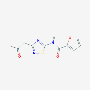 molecular formula C10H9N3O3S B2501020 N-(3-(2-oxopropyl)-1,2,4-thiadiazol-5-yl)furan-2-carboxamide CAS No. 743472-93-7