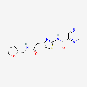 molecular formula C15H17N5O3S B2502315 N-(4-(2-oxo-2-(((tetrahydrofuran-2-yl)methyl)amino)ethyl)thiazol-2-yl)pyrazine-2-carboxamide CAS No. 1211010-21-7