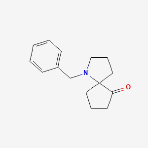 molecular formula C15H19NO B2502450 1-Benzyl-1-azaspiro[4.4]nonan-9-one CAS No. 2221965-34-8