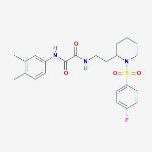 molecular formula C23H28FN3O4S B2504500 N'-(3,4-dimethylphenyl)-N-{2-[1-(4-fluorobenzenesulfonyl)piperidin-2-yl]ethyl}ethanediamide CAS No. 898445-28-8